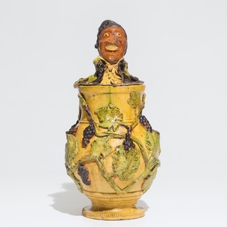 An exceptional Flemish pottery figurative tobacco jar, attr. to Leo Maes, 2nd half 19th C.